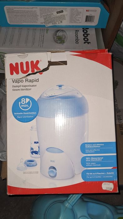 Стерилизатор  и биберони NUK
