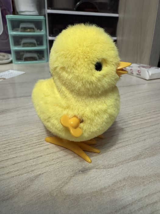 Игрушка цыпленок