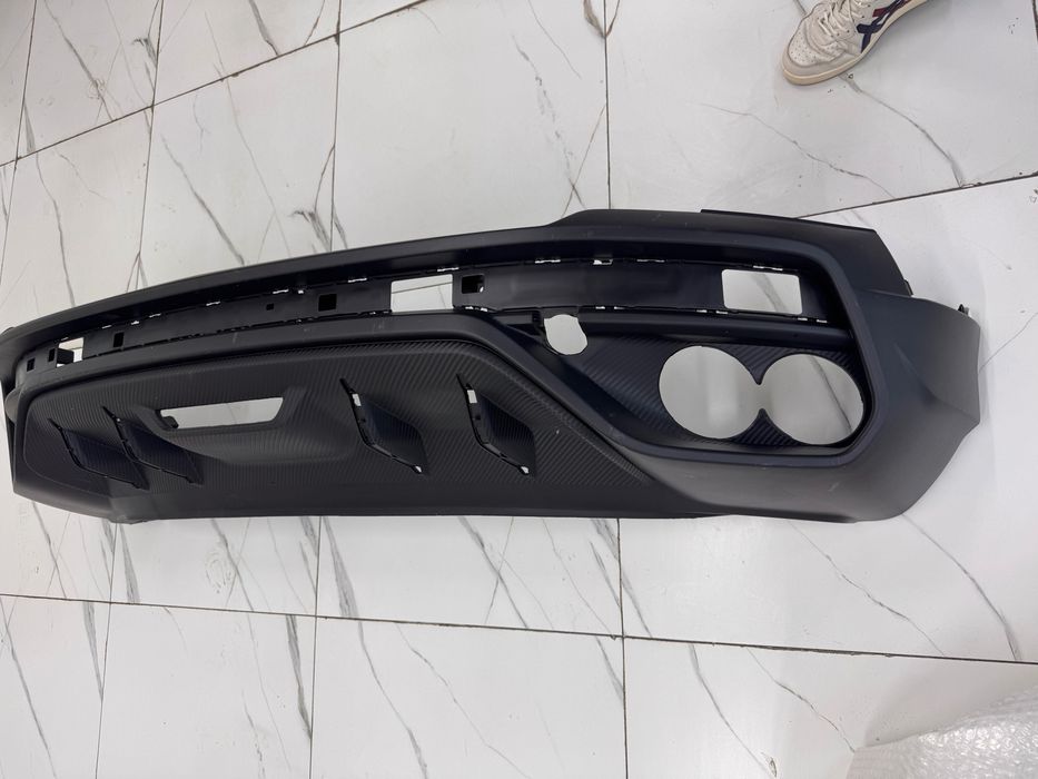 Задний бампер нижний часть Geely Coolray
