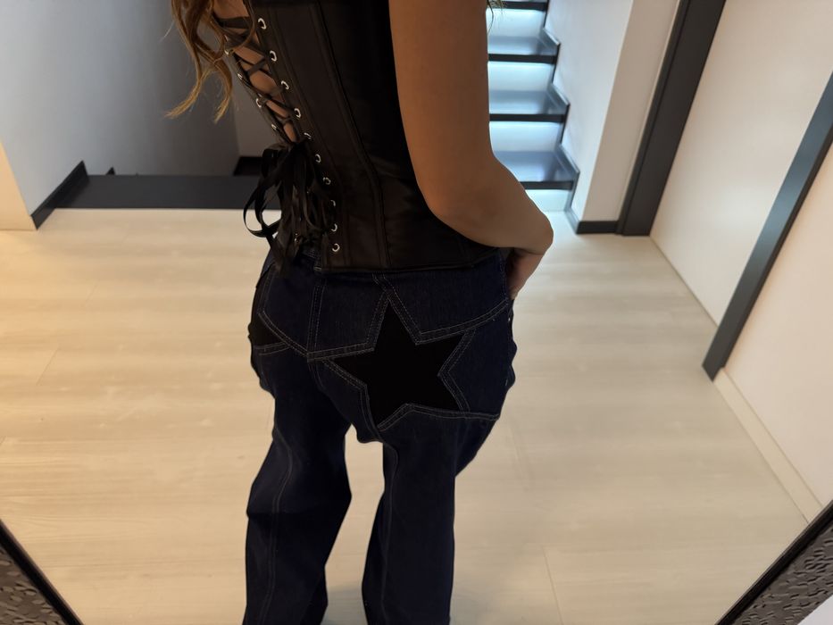 Jeansi stele pe fund