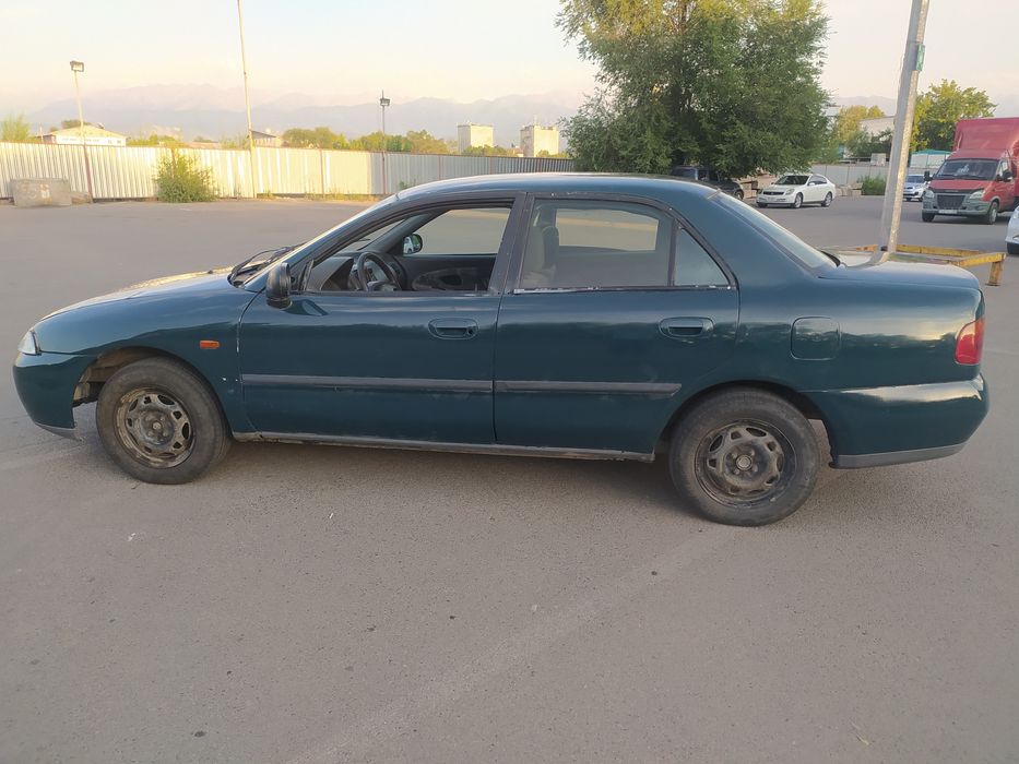 Mitsubishi Carisma БензинГаз