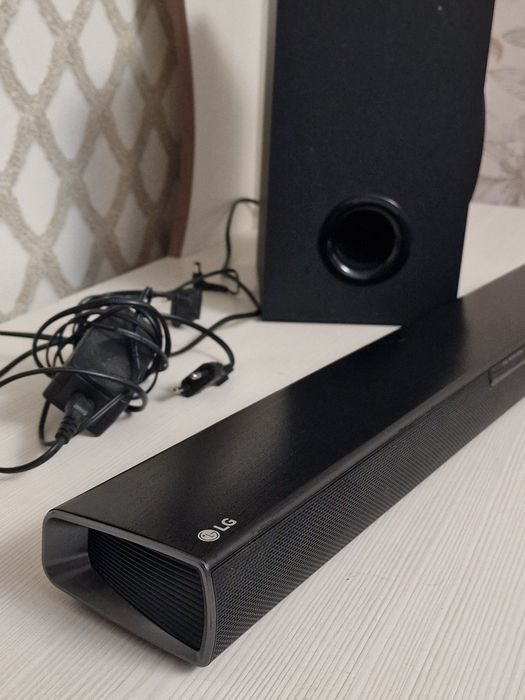 LG SQC1 саундбар с сабвуфером (Bluetooth/Оптика)