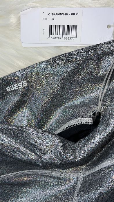 Colanti holografici Guess S si top Levi’s M