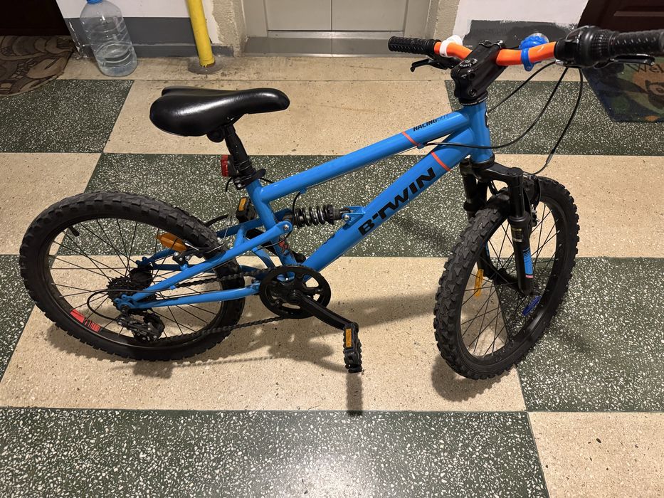 Vând bicicletă copii B’TWIN Rockrider 20” cu dublă suspensie