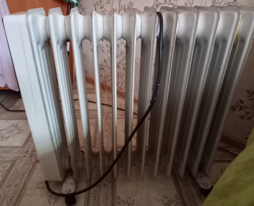 Продам масляный Эл. радиатор taurus