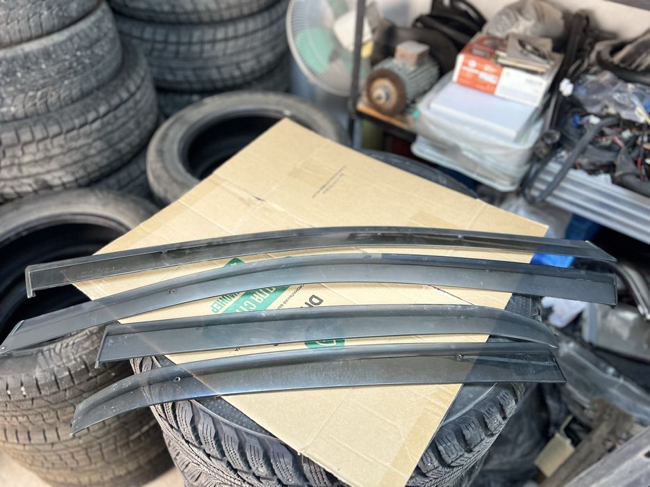 Дефлекторы окон (ветровики) на Toyota Corolla E150