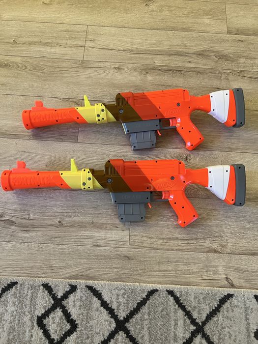 Vand 2 pusti de jucarie la pret de una tip Blaster Nerf Fortnite - HR, 6 proiectile + un set de proiectile