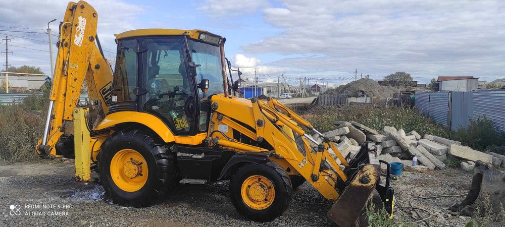 Услуги экскаватора-погрузчика