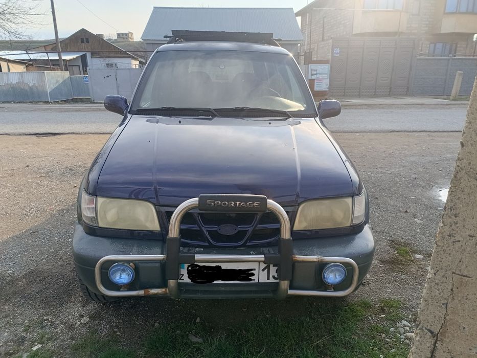 Автомобиль киа спортейж