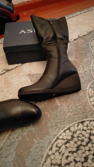 Кожаные сапоги женские