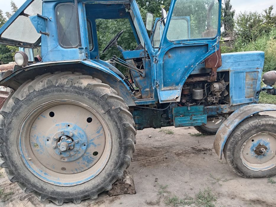 Продам трактор с плугом и косилкой