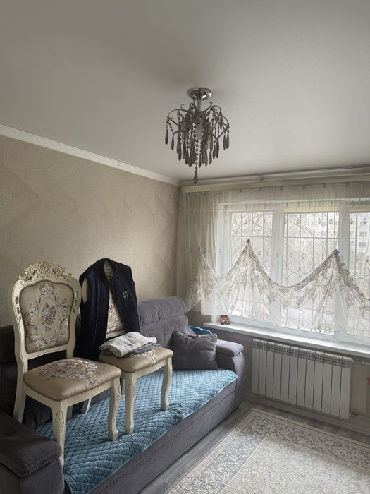 Теньевой тюль и люстры