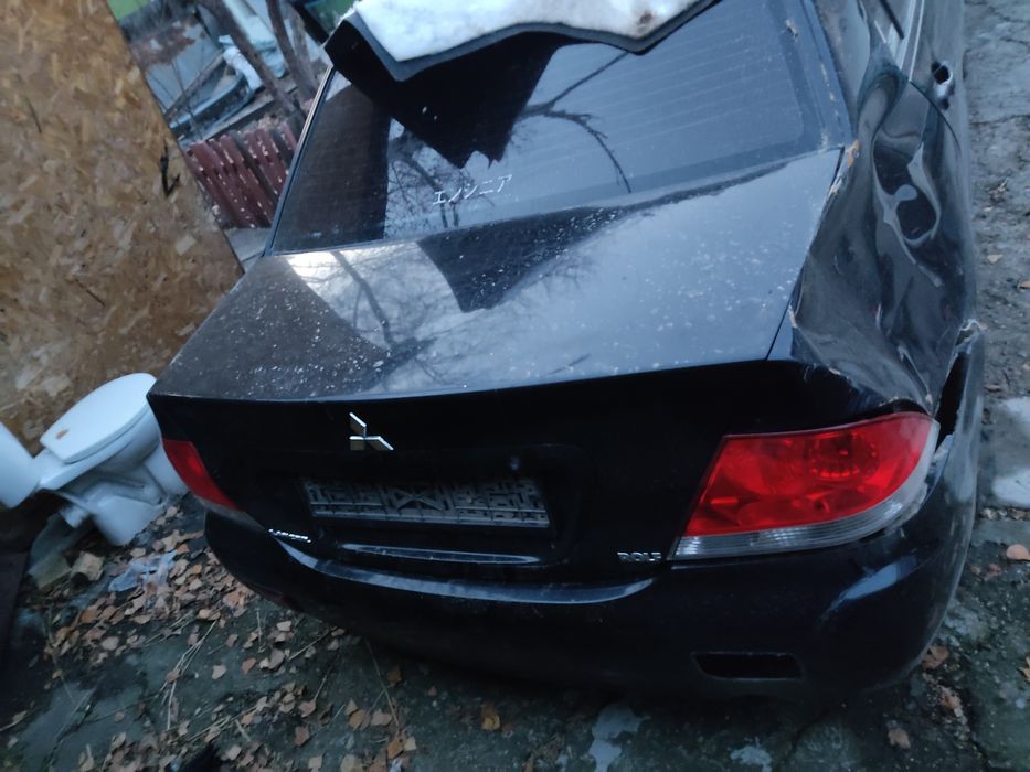 По запчастям Лансер