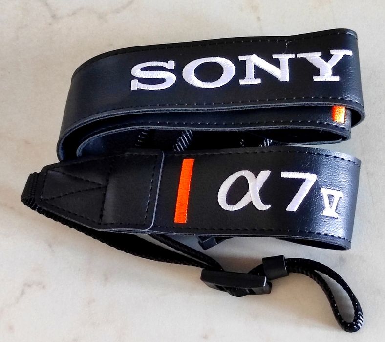 Curea pentru aparatul foto Sony