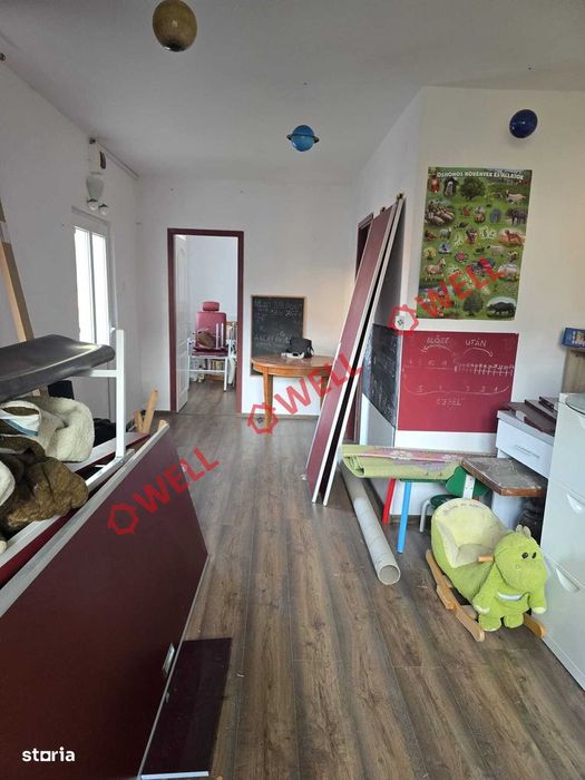 Casă din lemn de vânzare pe teren de 896 m²!