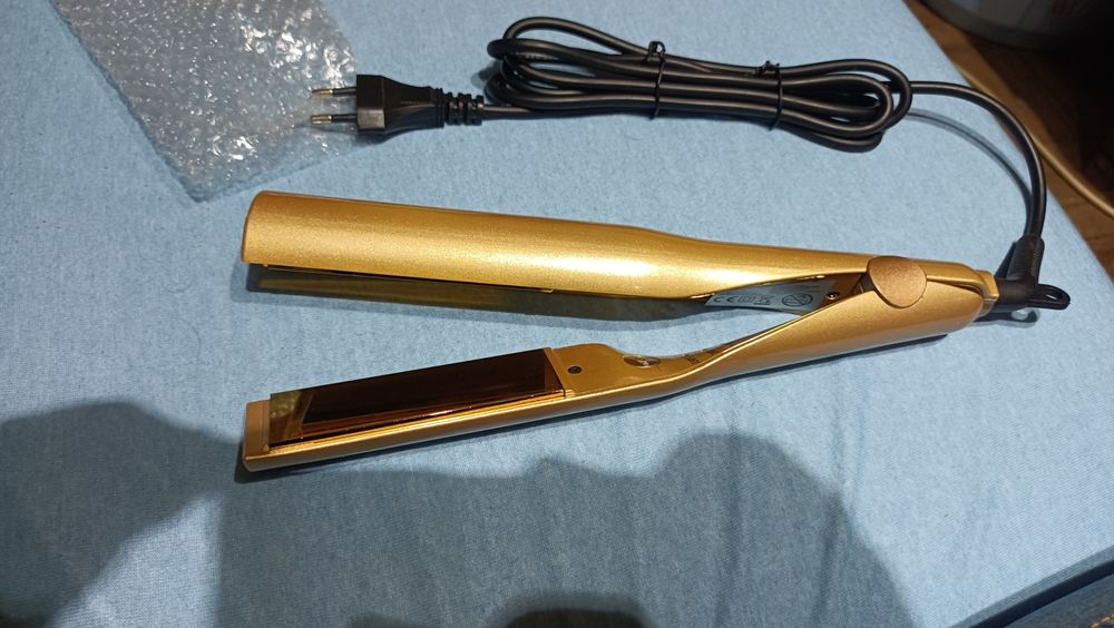 Преса за къдрене на коса