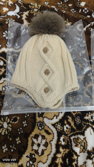 Продам детские шапочки новые