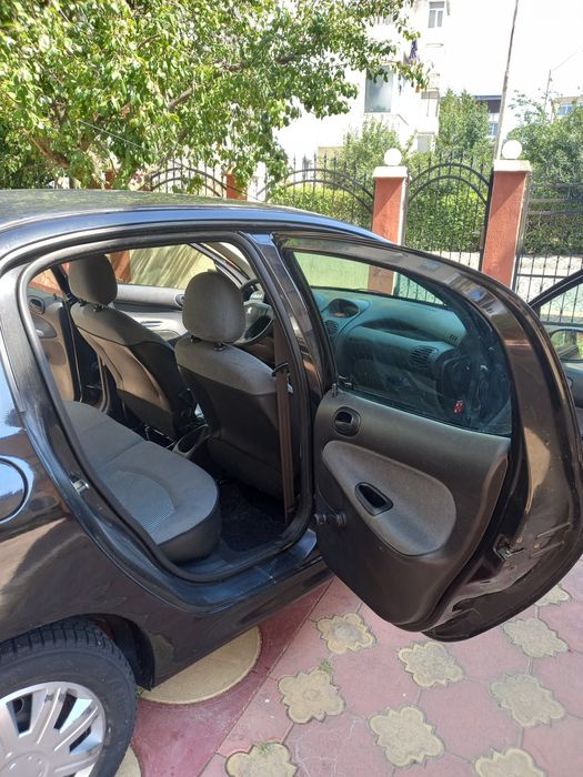 Vand urgent  Peugeot 206 sedan negru din 2007 Urgent perioada  sărbăt