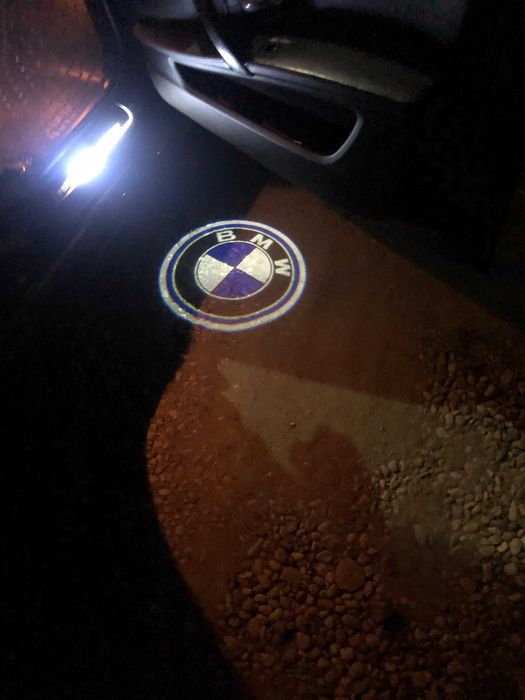 Set Lampi Logo (2 bucati sau 4) Bmw / Proiector/ Holograma Lumini Deschidere Usi E60/E65/E90/F10, G series, canbus (fara eroare), NOI