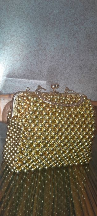 Ayollar sumkasi kafolati bilan