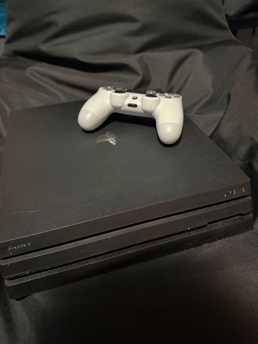ps4 pro cu un controller 1TB