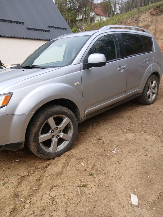 Vind Mitsubishi  Qulender An fab 2008 Amotor 2000 cm Geamuri electrice  ac  4x4.