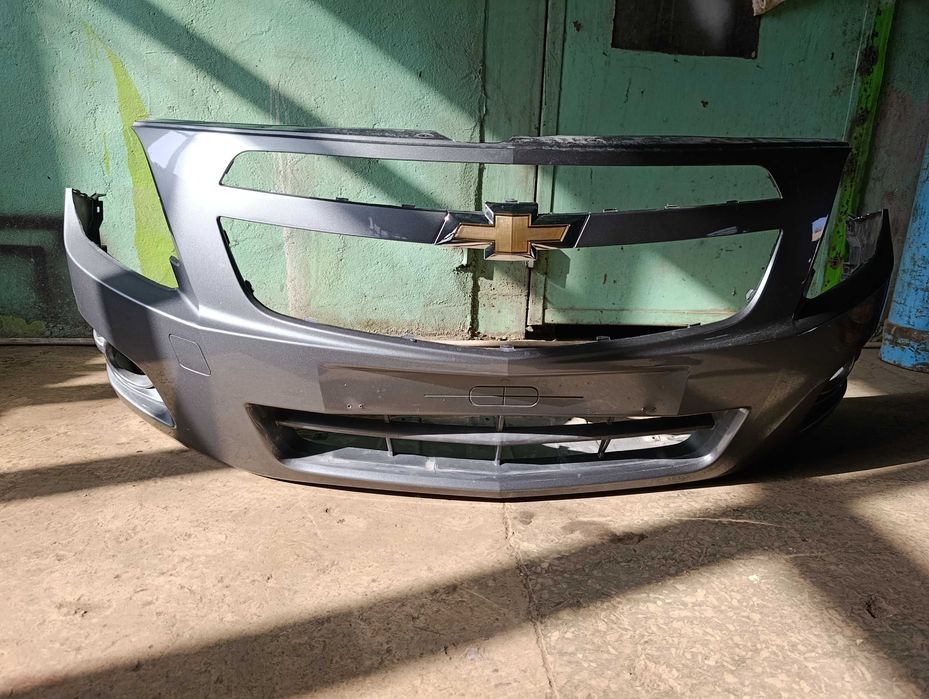 Продается передний бампер  cobalt мокрый асфальт