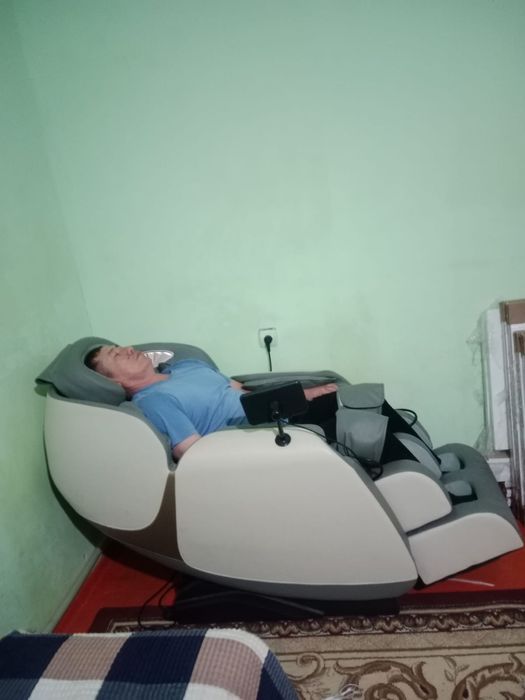 Массажный кресло