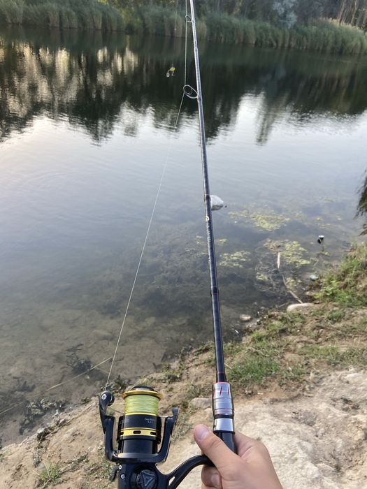 Продам спиннинг с катушкой