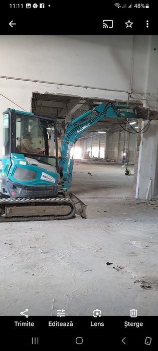 Demolari,decopertat,preluat molozul.