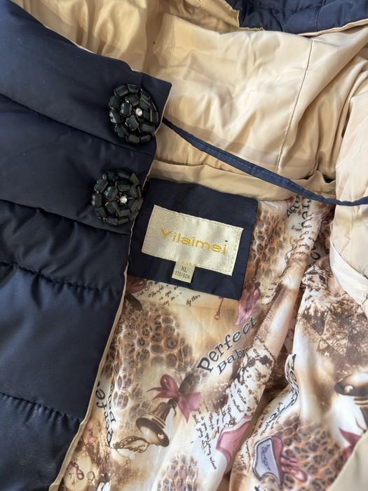 Продам пуховик новый!