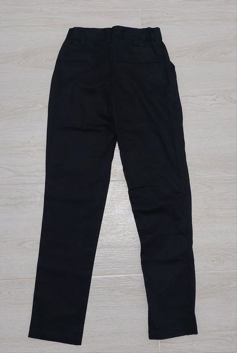 Pantaloni Erreà negri – Noi cu etichetă, model simplu, mărime XS