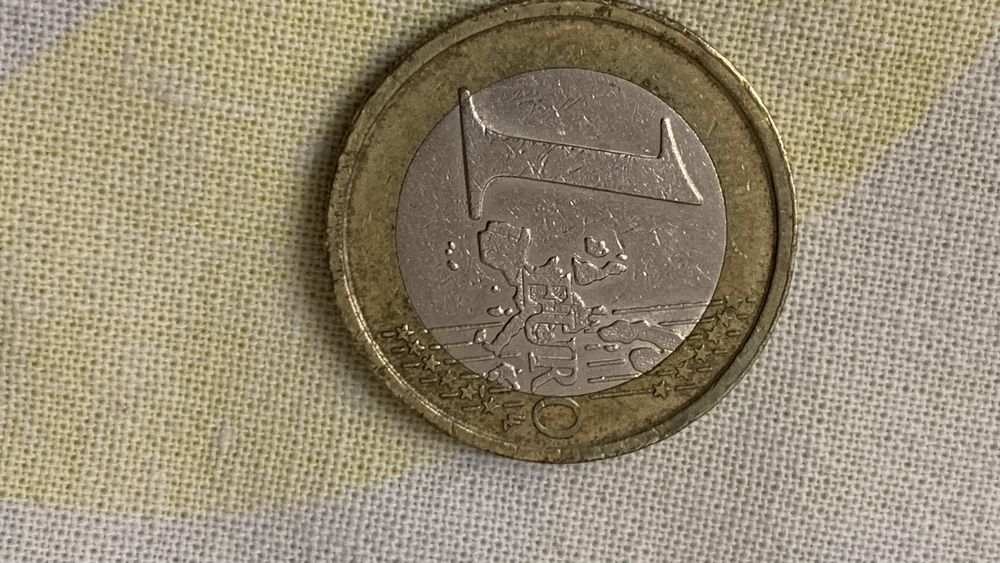 Монеты 2 и 1 евро