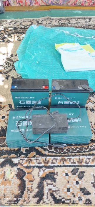 Akumlyator b/u zaryadchik bilan