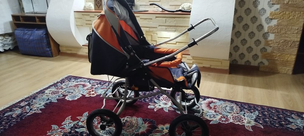 Всесезонная детская коляска PREGO