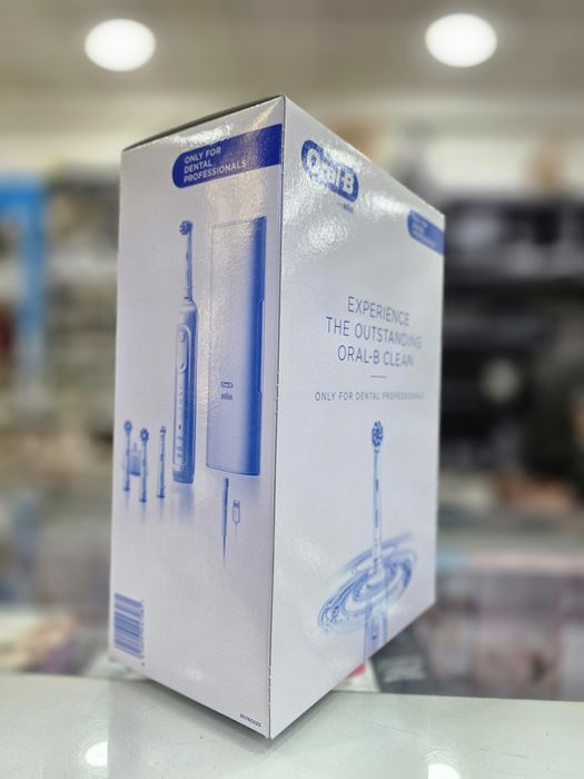 Электрическая зубная щетка Oral B Genius x 20000N Clean