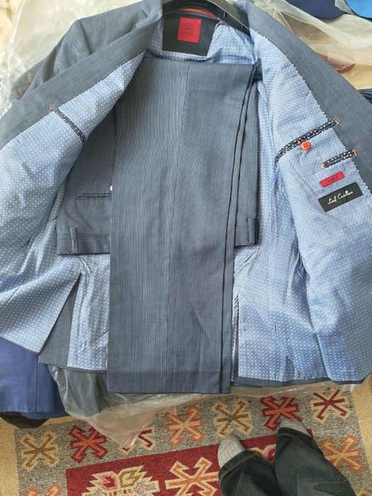 Мужские костюмы б/у