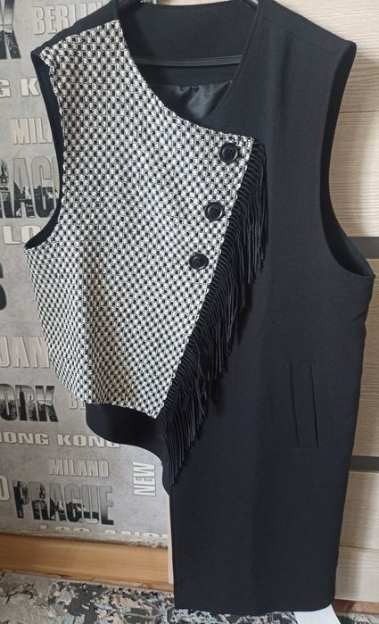 Продам жилет новый.