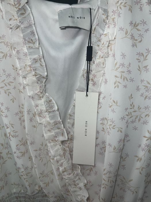 Rochie de damǎ cu flori
