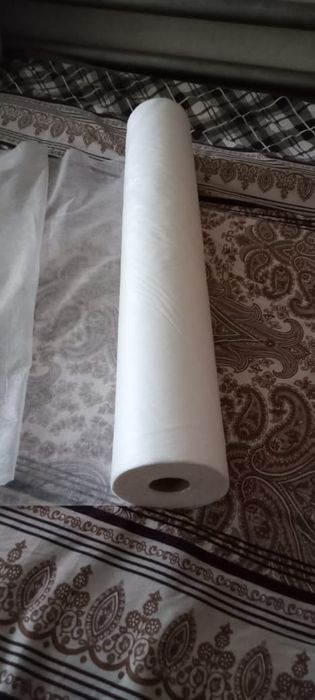 Одноразовые простыни в рулоне