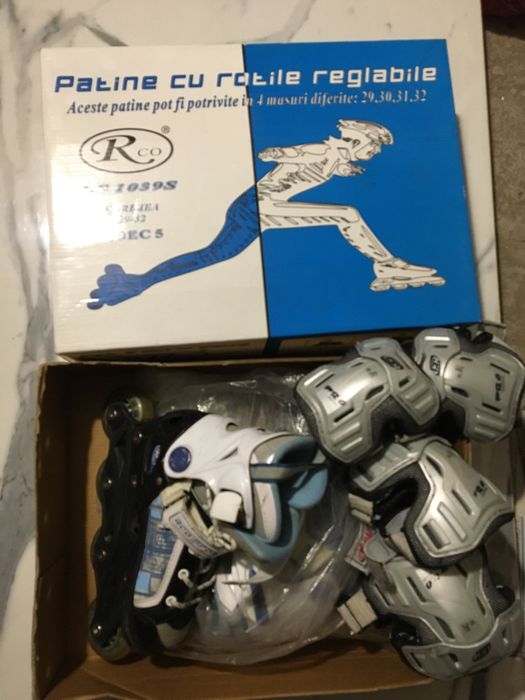 Penny board si role cu echipament de protectie