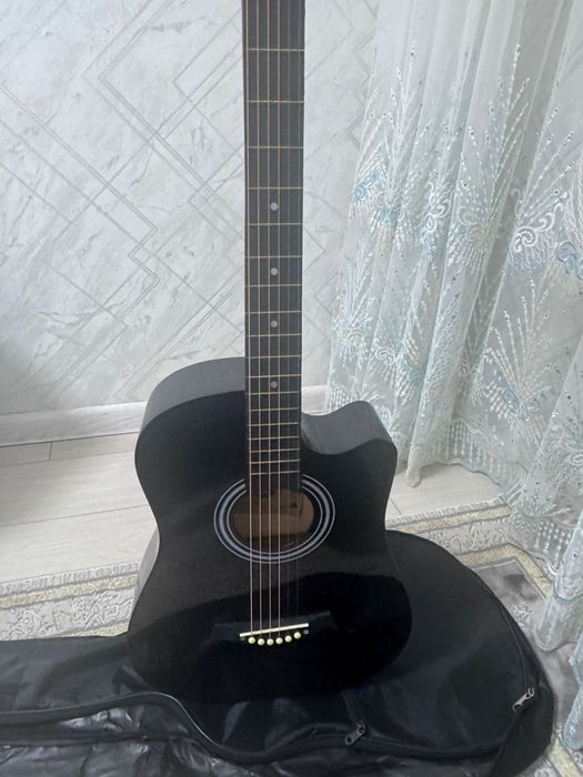 Гитара жағдайы жақсы