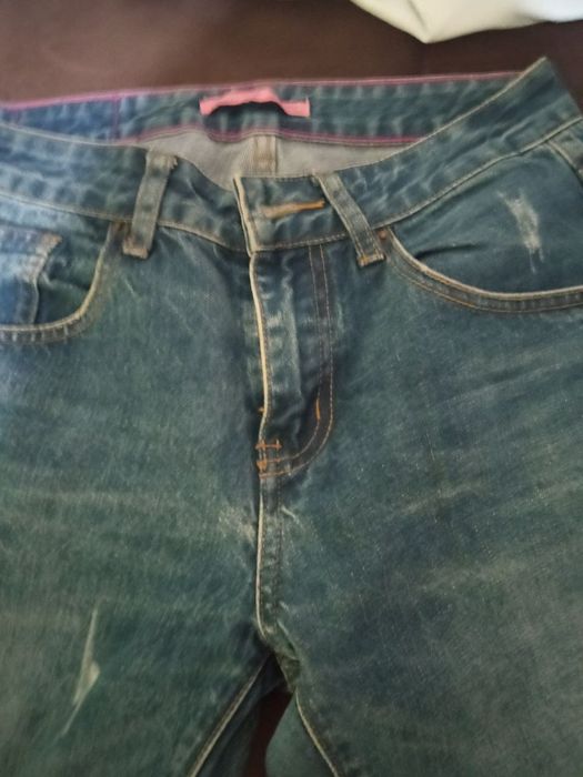 Женские джинсы в хорошем состоянии