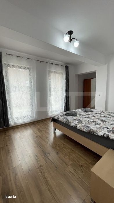 Apartament bloc nou, 72 mp, 2 dormitoare si living, parter, zona Nord
