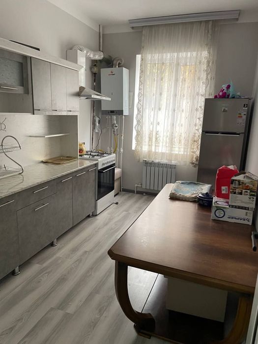 Уз саламан олдида  Янги курилган Дом.