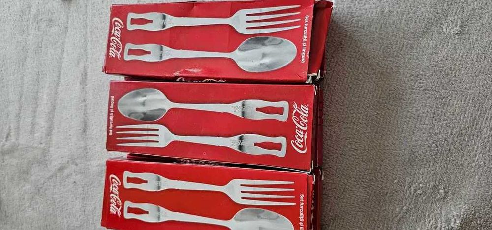 vand set tacam coca cola noi nefolosite