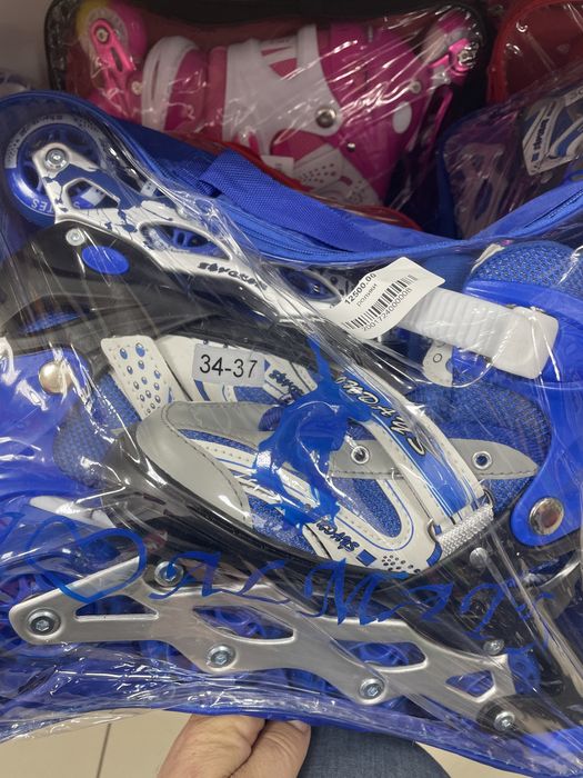 Роликовые коньки