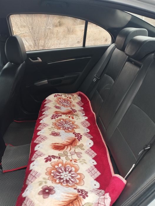 Джели емгранд 2015 г.1.8 об.