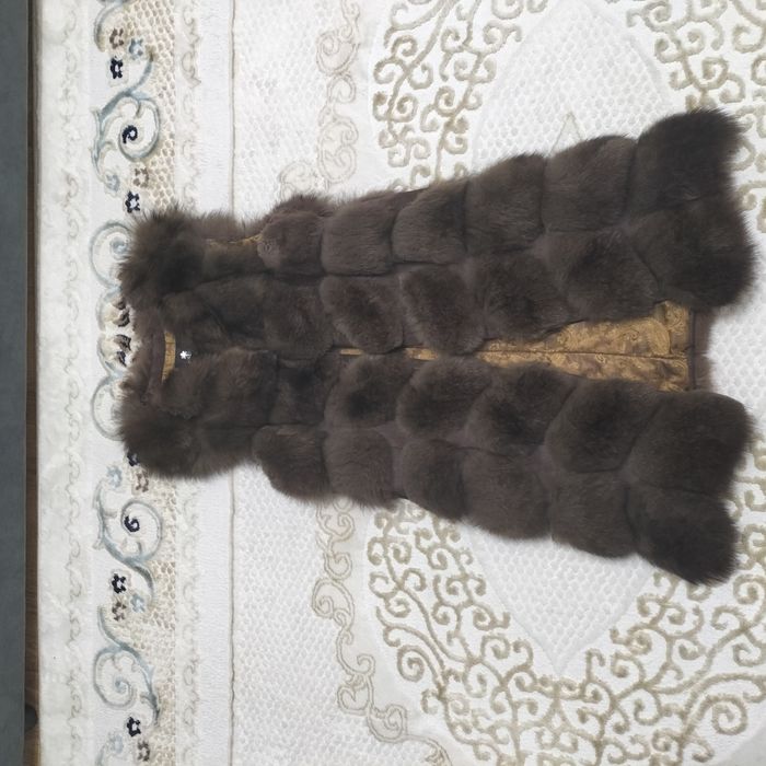 Безрукавка в продаже