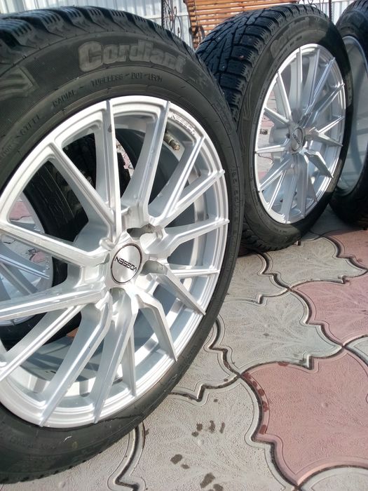 Зимние шипованные диски в сборе